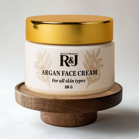 Jar of Moroccan Argan Face Cream on a wooden stand with a white background 
