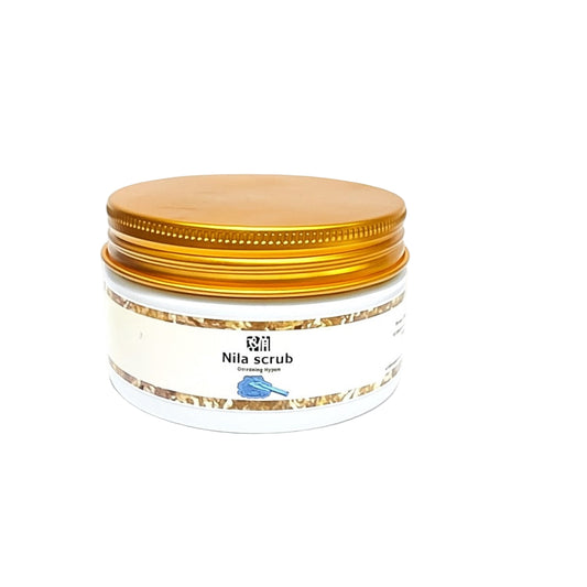 Jar of Nila scrub with a gold lid on a white background